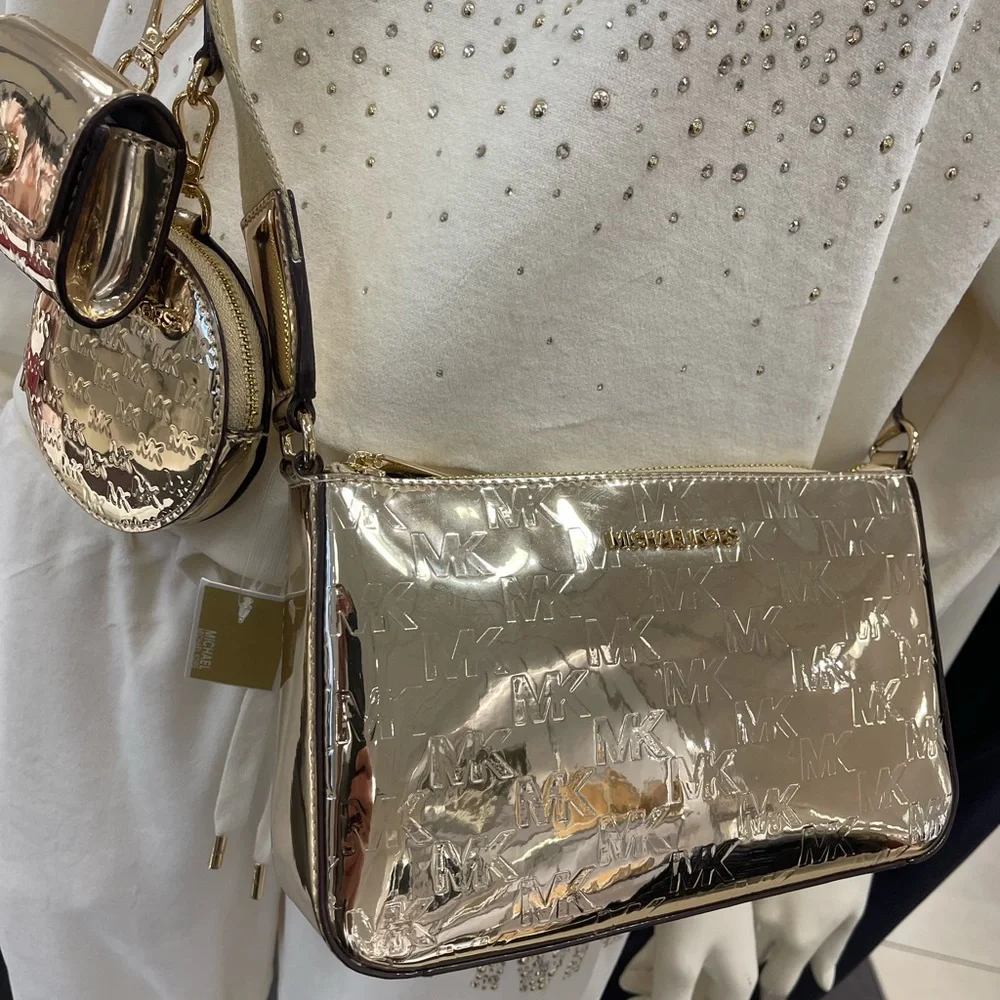 MICHAEL KORS Jet Set Sm Patent Logo Debossed Crossbody Apple Airpods
XBody Tech - Picture 5 of 12